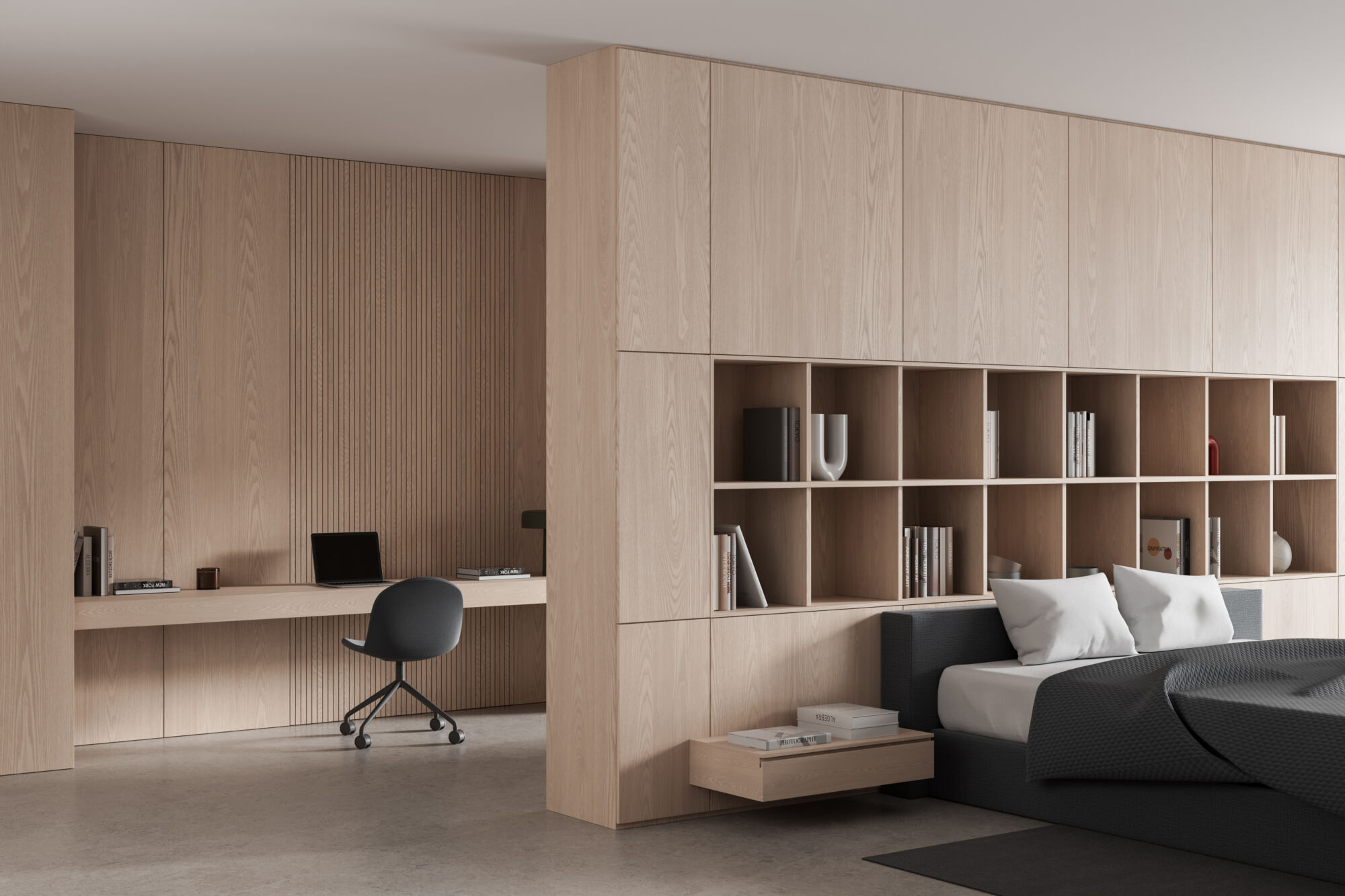 A minimalist bedroom with a built-in wooden desk and shelving unit, featuring a laptop, chair, and a bed with white pillows and a dark grey duvet. White oak wall panels from composite panels and decorative surfaces. Wall panel trend