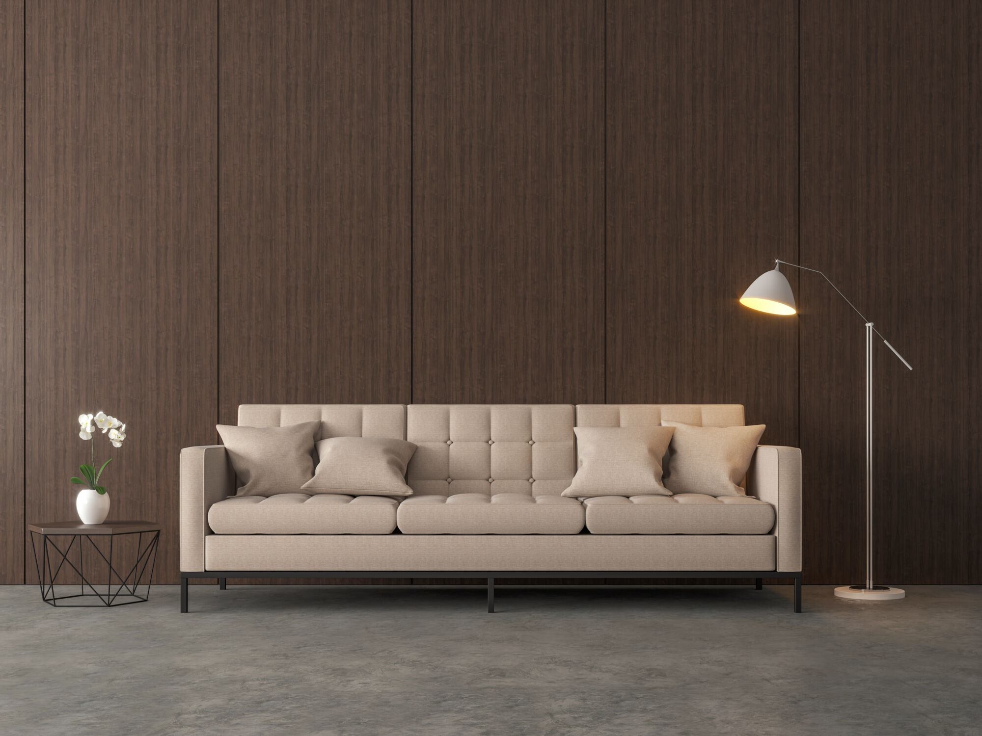 A modern living room with a beige tufted sofa, a side table with a white orchid, and a sleek floor lamp against a dark wood paneled wall from composite panel and decorative surface. Wall panel trend showcasing warm wood.