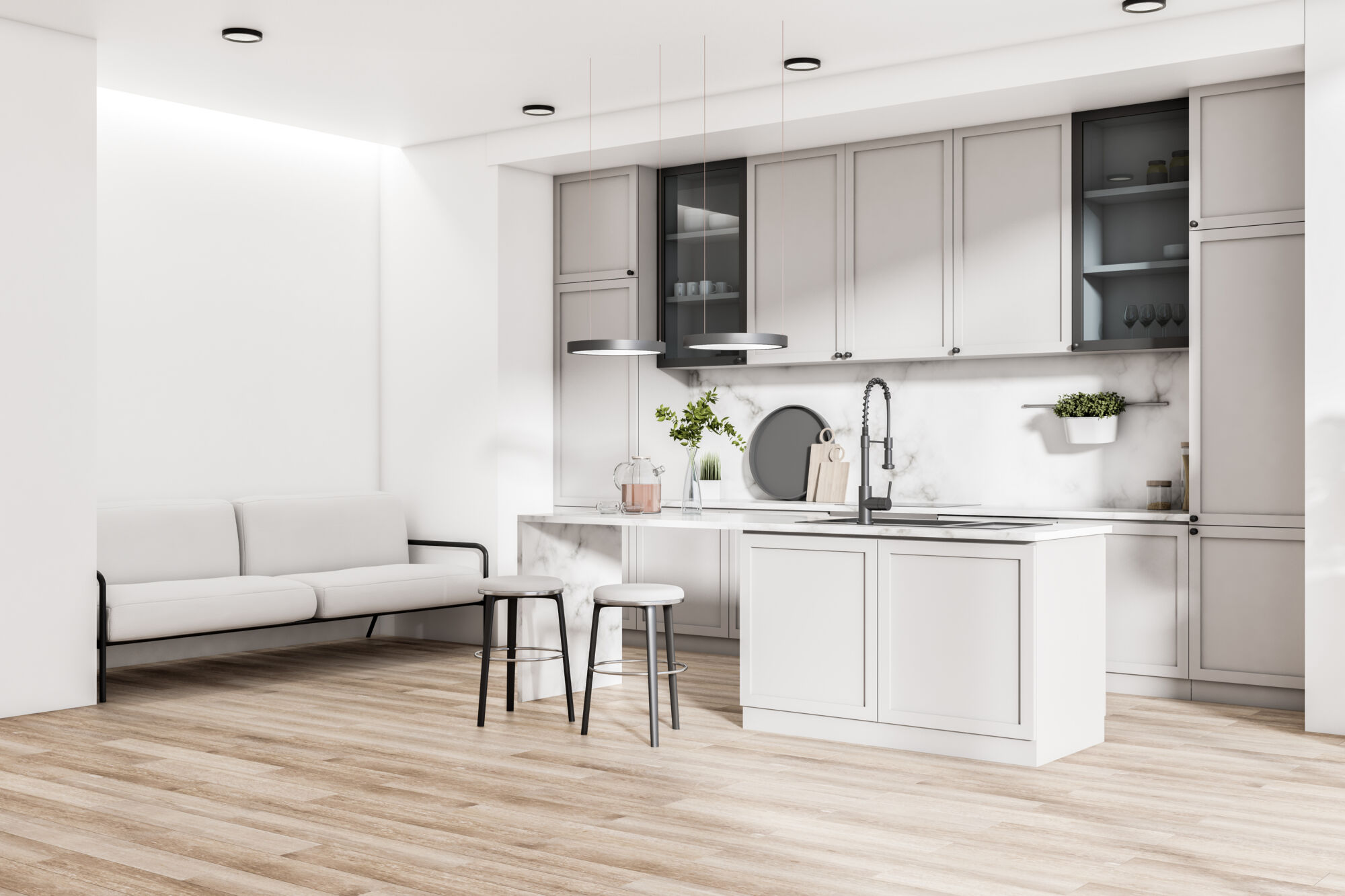 Slim Shaker Style in . A modern white kitchen with clean lines, featuring a central island with a sink and faucet, surrounded by sleek slim shaker style cabinetry and marble backsplash.